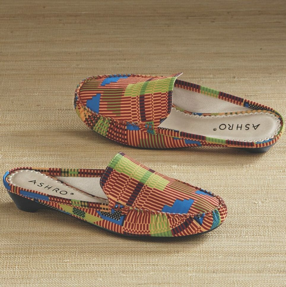 red, black, and lime green geometric-print slide shoe