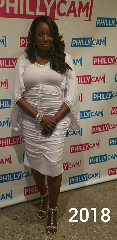 Ashro Woman of the Week, Alysha, an African-American woman with long dark hair, wearing a white dress.