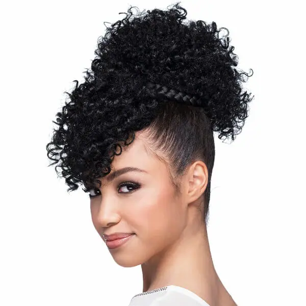 An African-American woman wearing a short, off-black wavy Vivica Fox wig with bangs and white top.