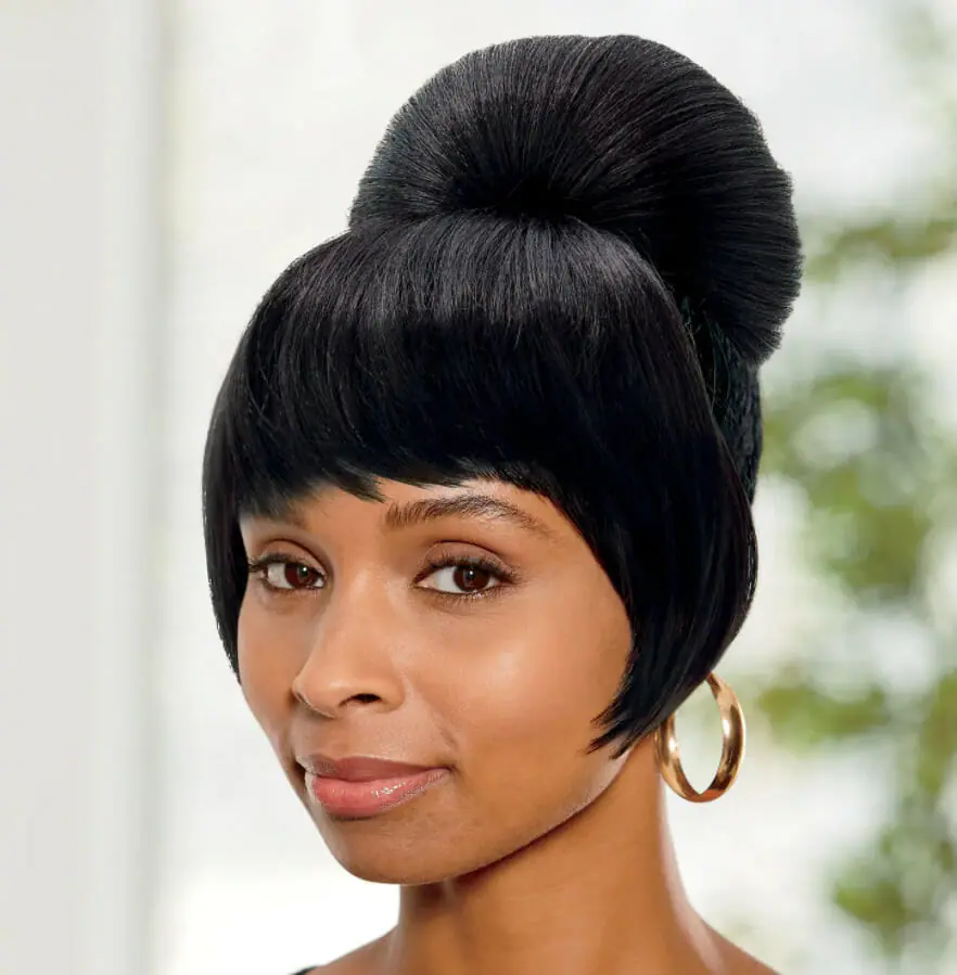 Ashro model wearing Vivica Fox Diego bang and bun