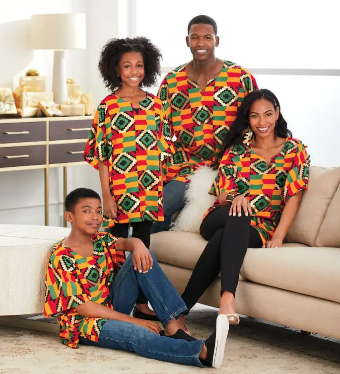 Black family wearing matching caftans