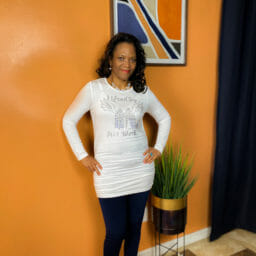 Kimberly (Ashro customer) photographed in white scrunchy Ashro top with detailed diamonds.