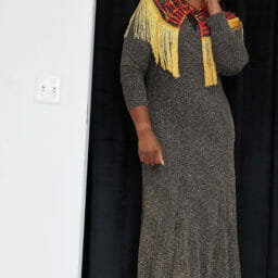 Ashro customer posing in long black dress