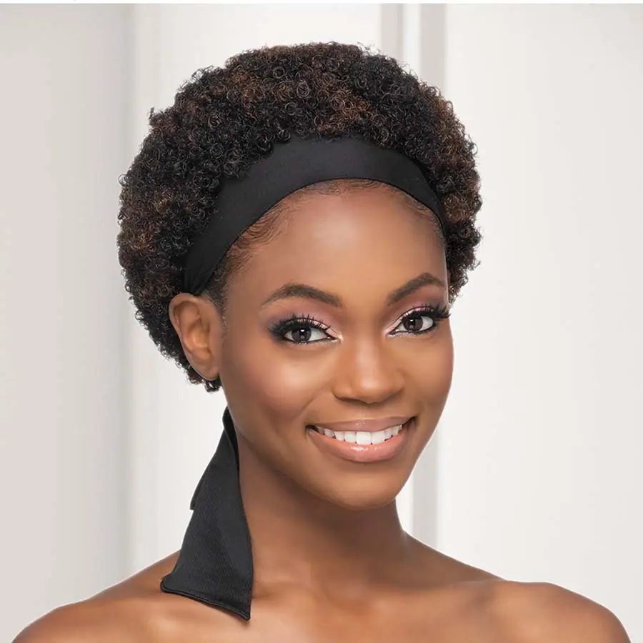 African American woman with natural curly short hair.