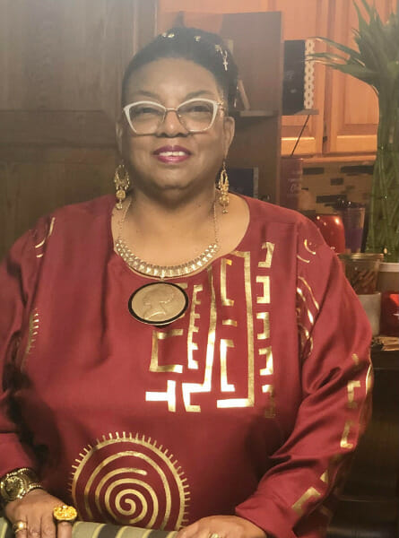 woman in a red afrocentric dress
