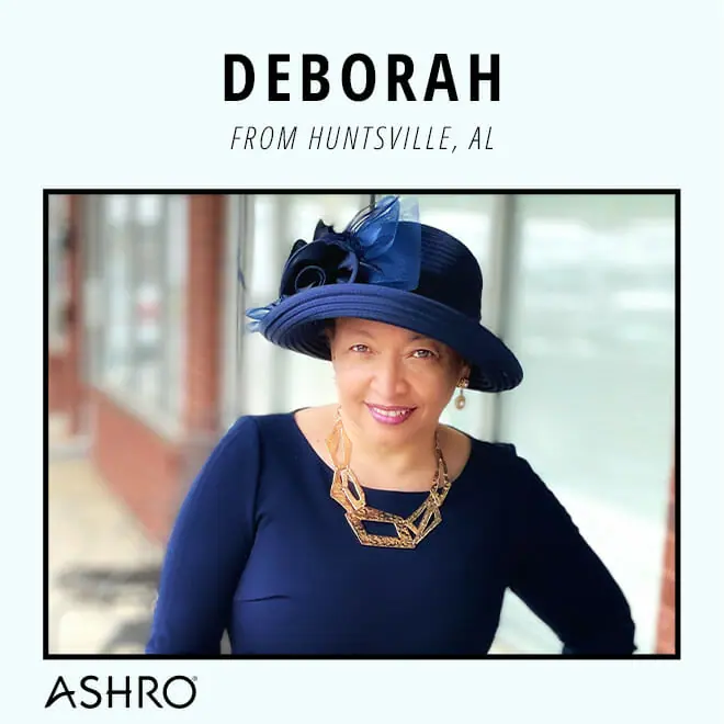 woman in blue dress and blue hat