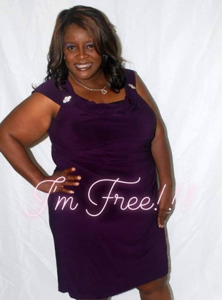 woman posing in a purple dress with the words "I'm Free" overlayed.
