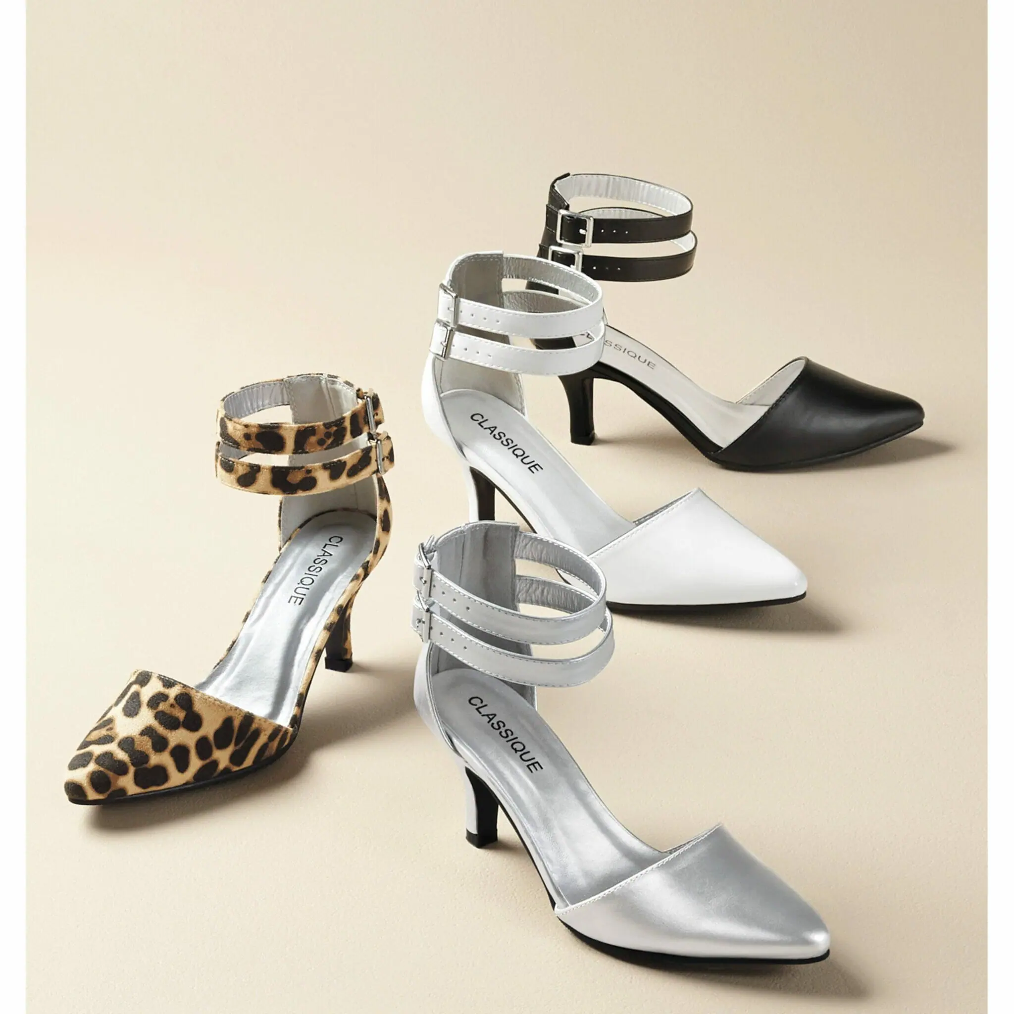 Leopard, silver metallic, white patent, and black Classique pump.