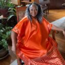 Woman in orange Caftan