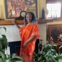Woman in orange Caftan