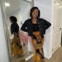 Woman in African skirt posing