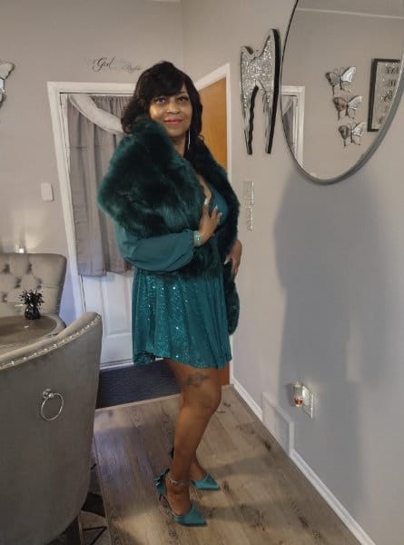woman in a teal dress