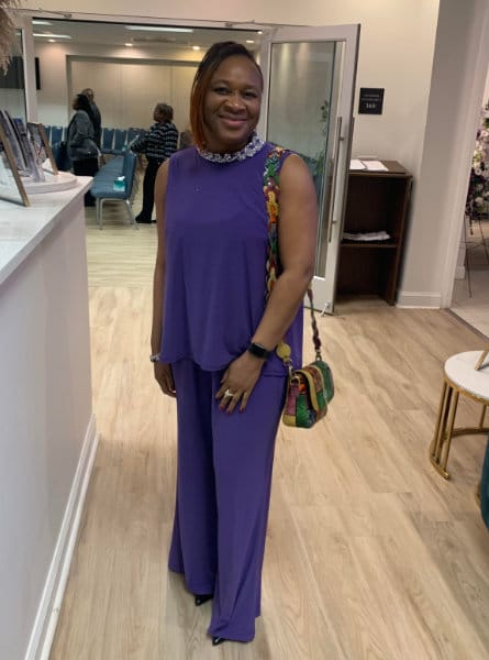 Woman in a purple dress.