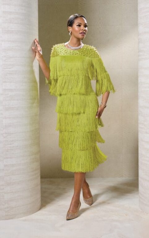 Model wearing the Maizie Fringey Embellished Sheath Dress, showcasing the sleek sheath silhouette, all-over fringe detailing, and tonal bead embellishments at the neckline.