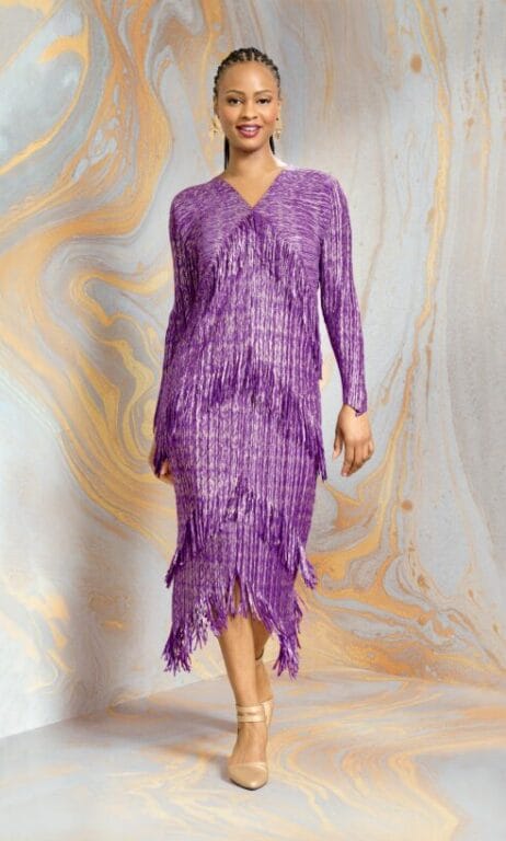 Model wearing the Jerianne Fringe Maxi Dress, showcasing its metallic foil finish, tiered angled fringe, and elegant flowing silhouette.