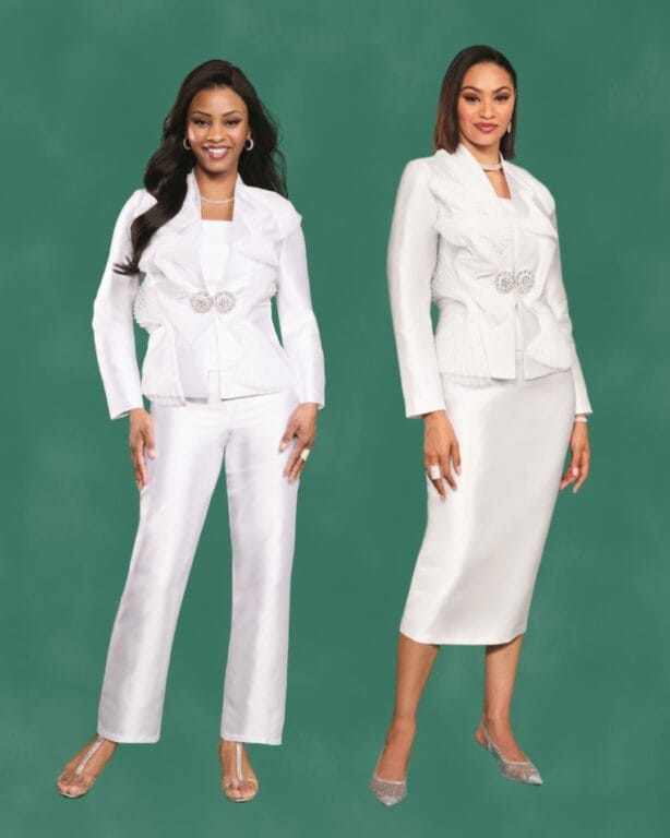 Two women in matching white satin suits with jeweled brooches.