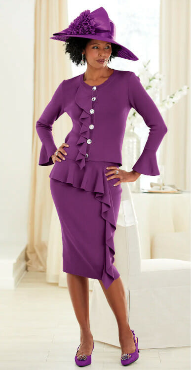 Black woman wearing a purple ruffle suit