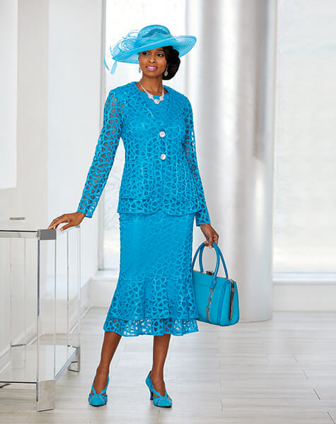 black woman in blue lace like jacket dress and matching hat