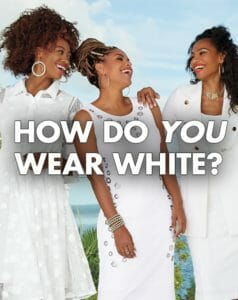 How Do You Wear White? Three smiling black women wearing either a jacket dress, a dressy sleeveless dress, or a pantsuit.