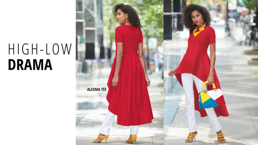 'High-Low Drama'-a black woman in a red high-low tunic that has a long flowing back, and white pants.
