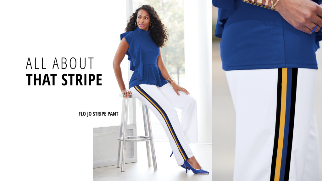 'All About That Stripe'-a black woman wearing white pants with a blue and gold stipe on the sides and a blue blouse.