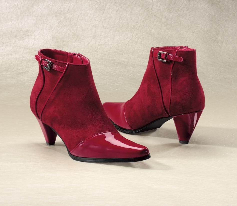 Red faux-suede with patent accents heeled bootie.