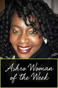 Ashro Woman of the Week, Seletha, a smiling black woman with curly hair and bangs, wearing white earrings.