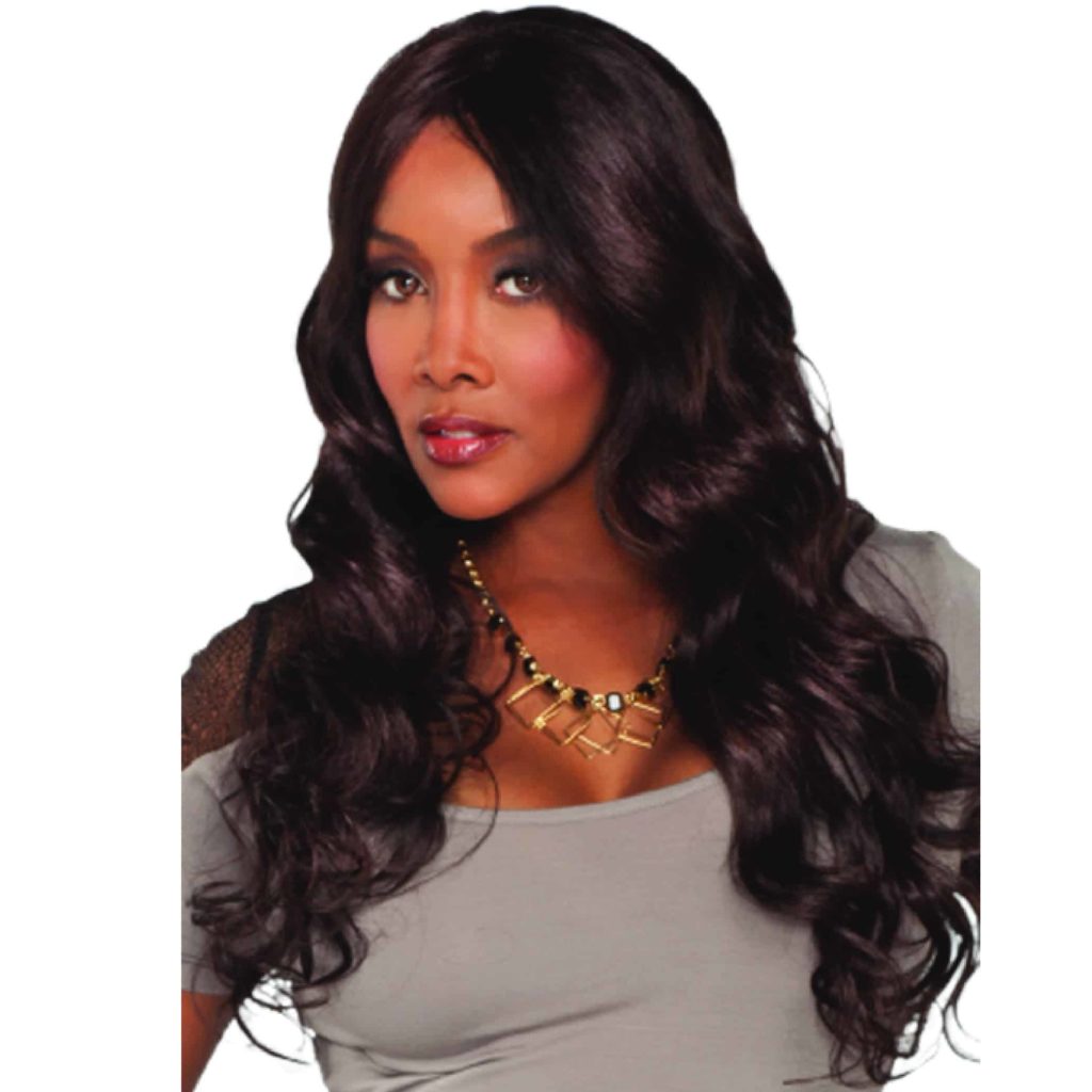 An African-American woman wearing gray top, necklace, and a long, wavy off-black wig by Vivica Fox.