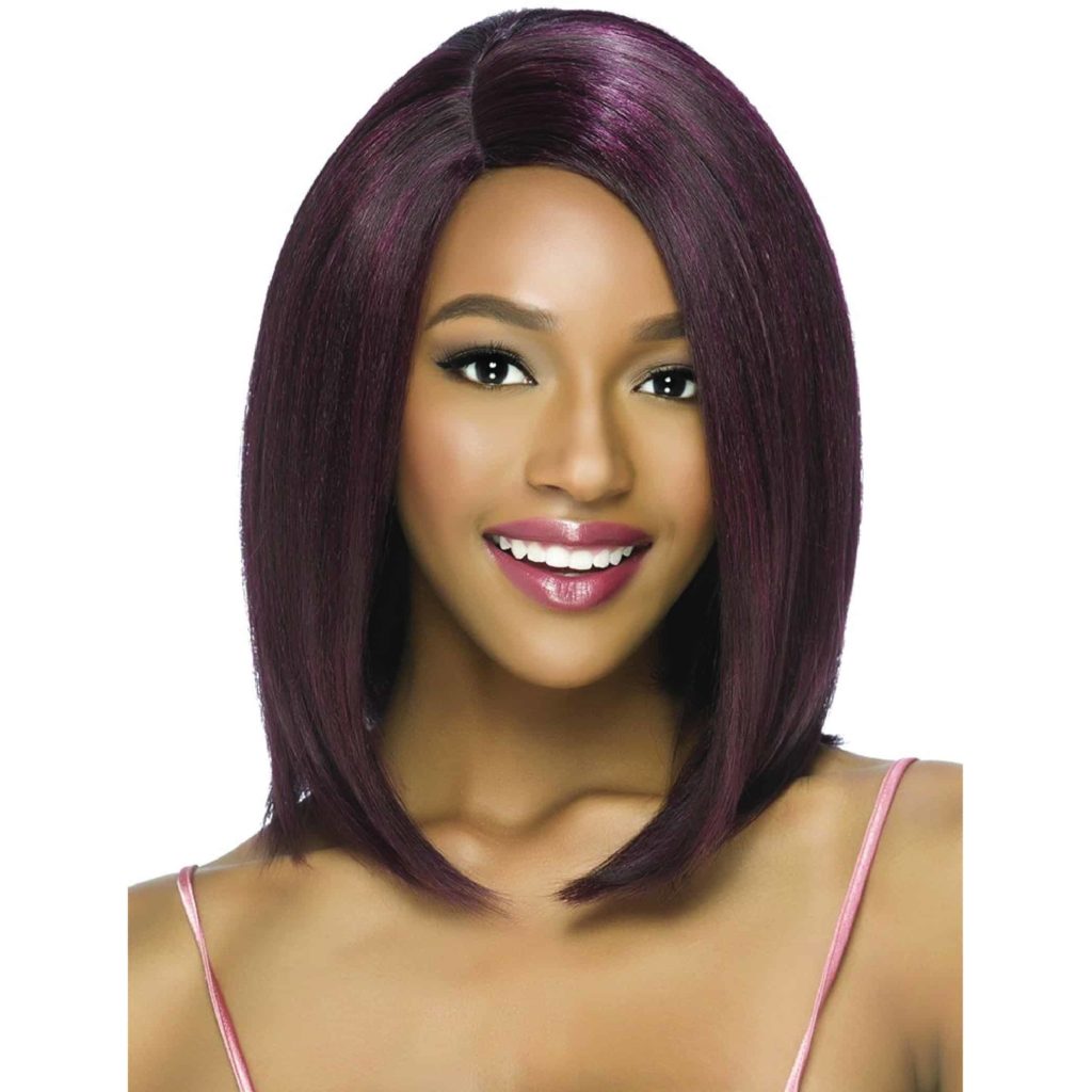 A smiling African-American woman wearing a smooth, shoulder-length burgundy wig by Vivica Fox.