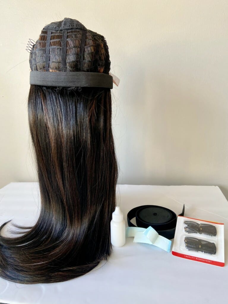 Wig band on a wig, wig clips and wig glue.