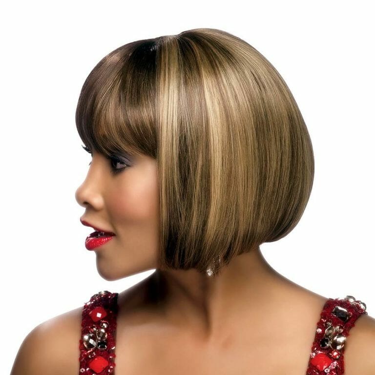 African American woman wearing the Vivica Fox Human-Hair Bob Wig in Medium Dark Brown Honey Blonde Copper Blonde