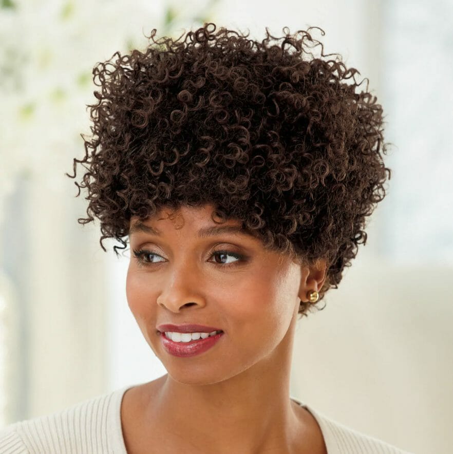 Black woman wearing a wig