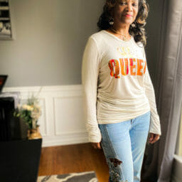 Kimberly (Ashro customer) posing forward wearing Ashro Royal jeans with Ashro Queen shirt.