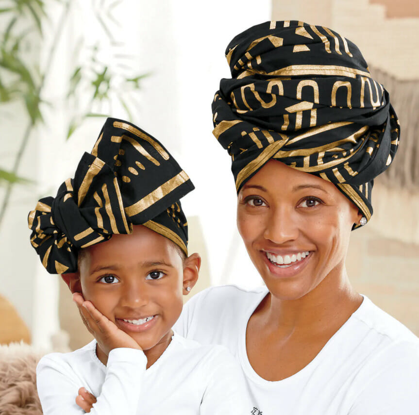 Woman and child wearing matching royalty headwrap