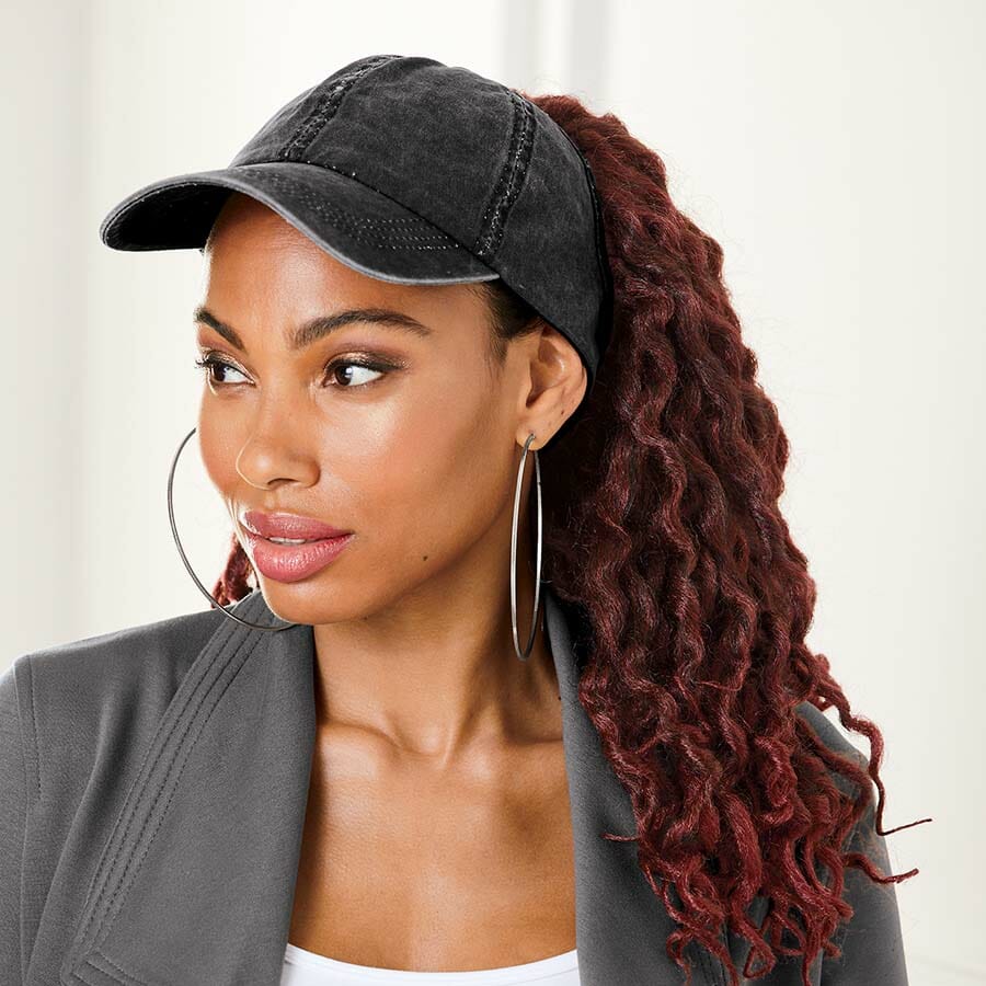 African American woman wearing Jordan Cap Wig in Wine Off Black.