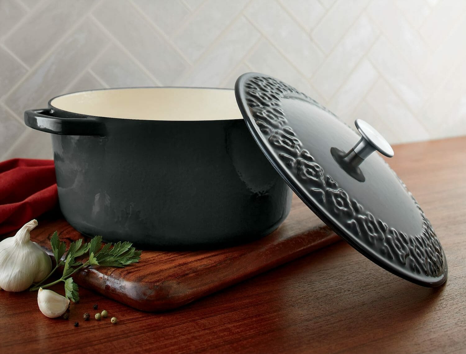 Cook up and serve up your specialties—with style! Stock pot is enamel on cast iron, with embossed lid and stainless-steel knob. Oven, stove top and dishwasher safe.
