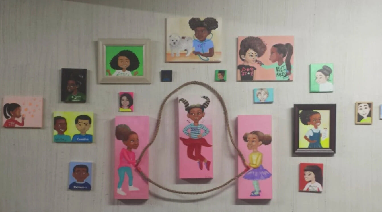 Canvas painting of three little black girls playing jump rope. 